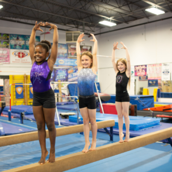 Working on Form in Gymnastics Class